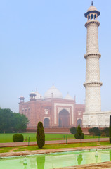 Taj Mahal architectural complex in morning mist