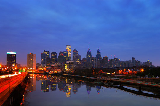 A dusk image of Philadelphia reflected in the Scullykill River