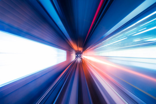 Abstract train moving in tunnel