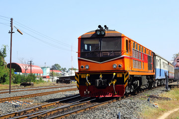 Fototapeta na wymiar Red orange diesel engine locomotive