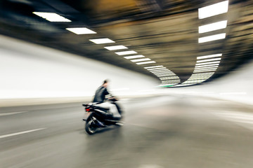 Interior of an urban tunnel with motorcycle,motion blur