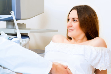 pregnant woman on reception at the doctor