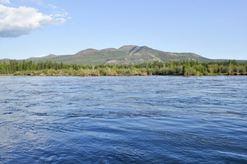 Landscape: mountains, sky, river.
