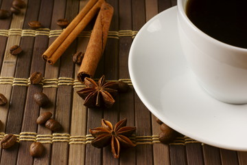 Coffee with cinnamon and beans