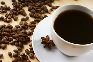 Coffee with cinnamon and beans