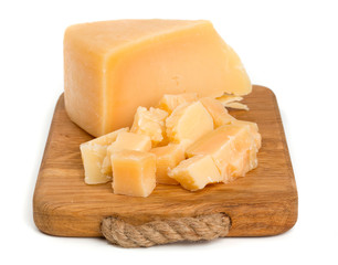 parmesan cheese on cutting board isolated