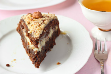 Chocolate cake with buttercream and nuts