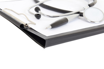 close up of clipboard, pen and stethoscope isolated on white
