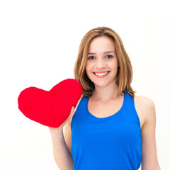 young woman holding a red heart