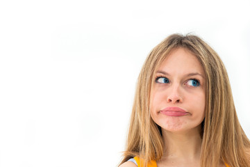 Young woman making a funny grimace - obrazy, fototapety, plakaty