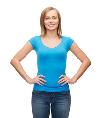 Fototapeta premium smiling girl in blank blue t-shirt