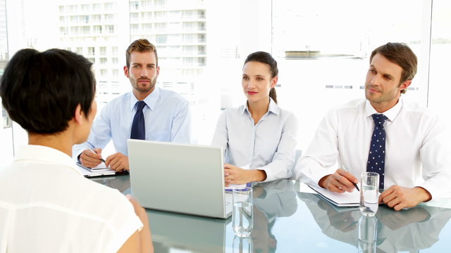 Interview panel speaking to applicant