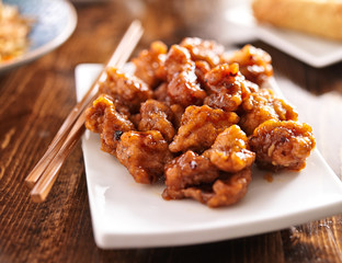 chinese orange chicken with chopsticks