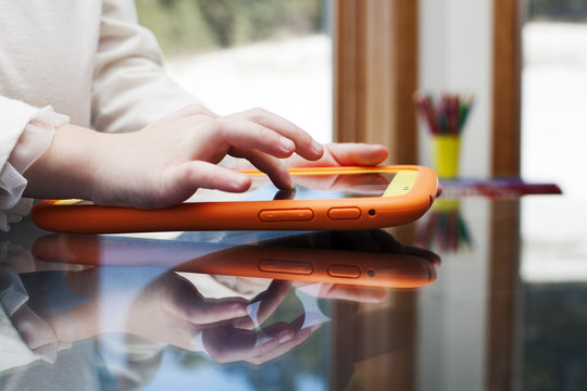 child uses a Tablet PC