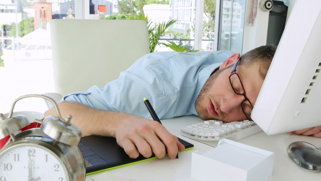 Handsome businessman sleeping
