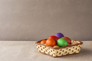 background colorful Easter eggs basket