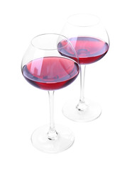 Wineglasses with red wine, isolated on white