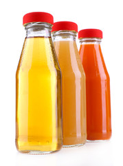 Baby food (juices) in glass jars, isolated on white