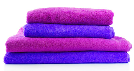 Colorful towels isolated on white