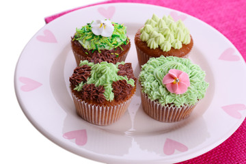 Tasty cupcakes with butter cream,