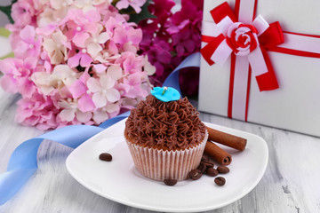 Tasty cupcake with butter cream,