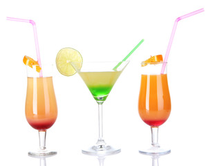 Glasses of tasty cocktails isolated on white