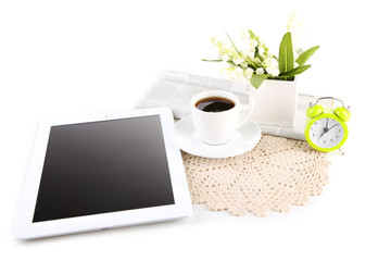 Tablet, newspaper, cup of coffee and alarm clock, isolated