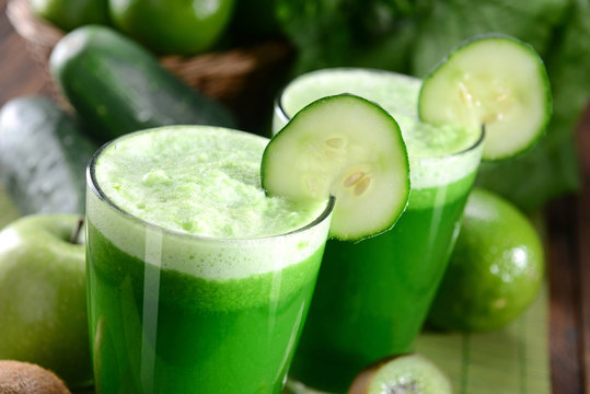 Two glasses of green juice