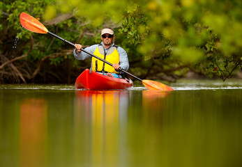 man kayaking in florida
