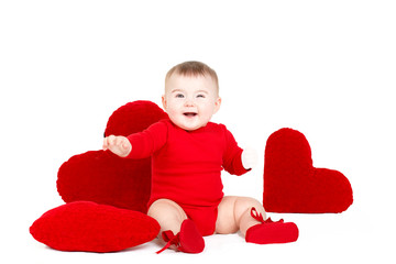 Portrait of little girl c large toy heart on white background