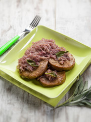 seitan with onions and sage, selective focus
