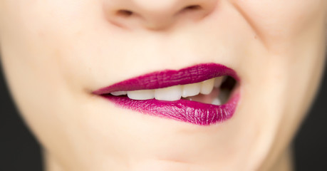 Obraz premium biting lips