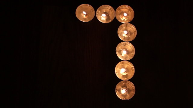 Digit  seven made of candles