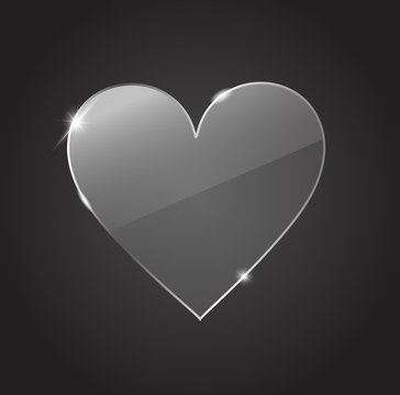 Glass transparent heart on the black background vector