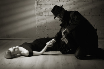 Detective investigating the crime scene