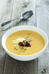 Potato cream soup with bacon and cheese