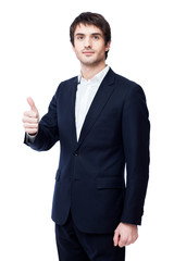 Smiling businessman with thumb up