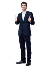 Smiling businessman with thumb up