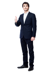 Smiling businessman with thumb up