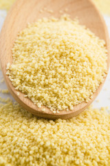 couscous in wooden spoon