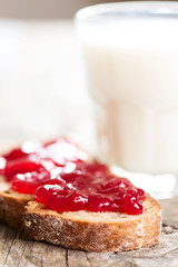 Bread with strawberry jam closeup
