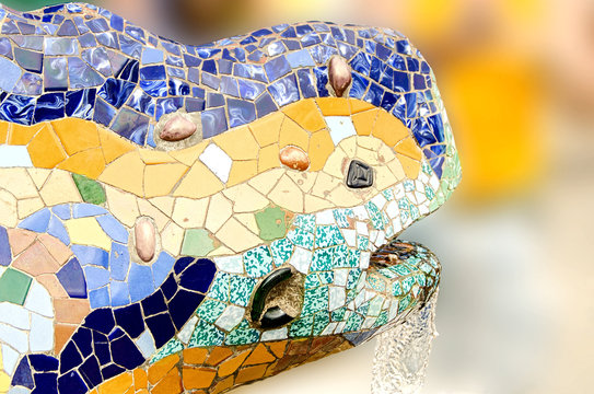 Fountain mosaic salamander head in the park