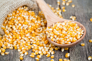 corn in wooden spoon