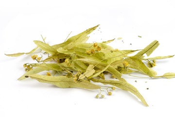 Dried linden tea on a white background