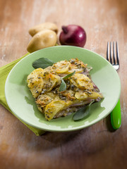 cake with potatoes and onions, selective focus