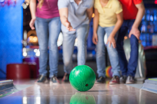 Group of friends bowling.