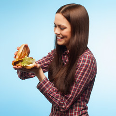 girl prepares a burger