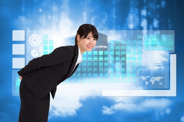 Composite image of smiling businesswoman bending