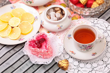 Warm cup of tea and sweets