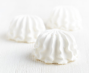 White marshmallow on wooden table